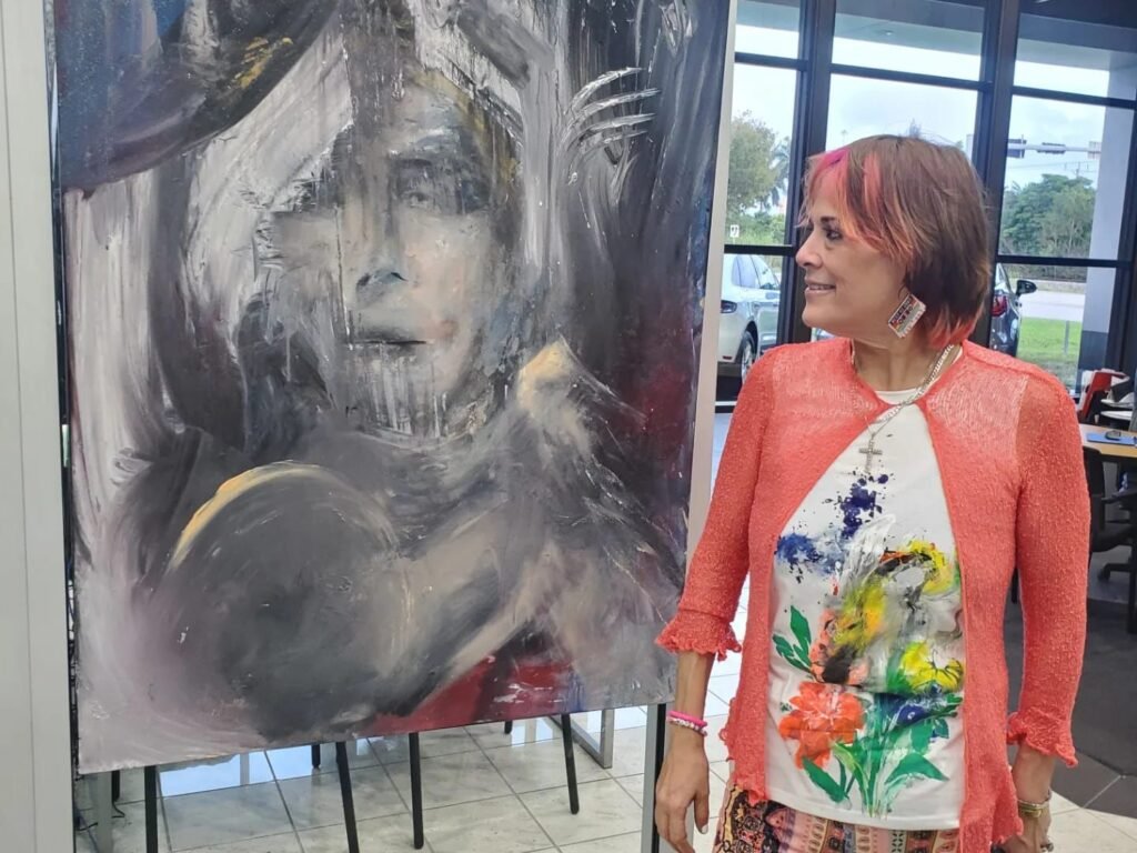 Arnoux & one of her paintings